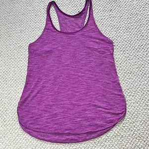 Lululemon fuchsia lightweight dolphin hem, racer back workout tank Size Medium